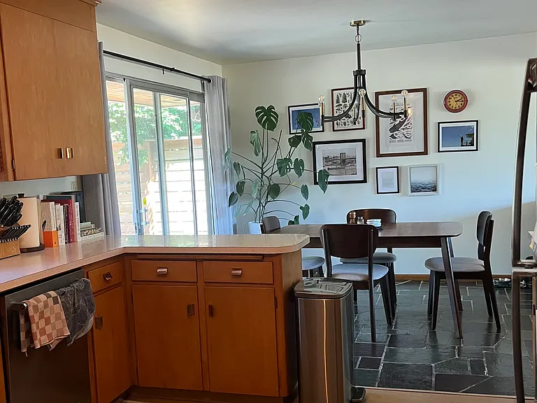 Kitchen with mid-century details, dining room.