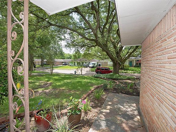 From your front porch you look out to a majestic oak tree in this desirable neighborhood.