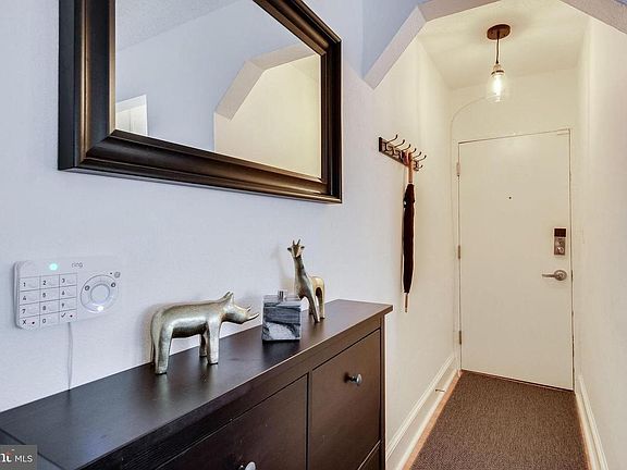 Entryway with coat rack and shoe cabinet