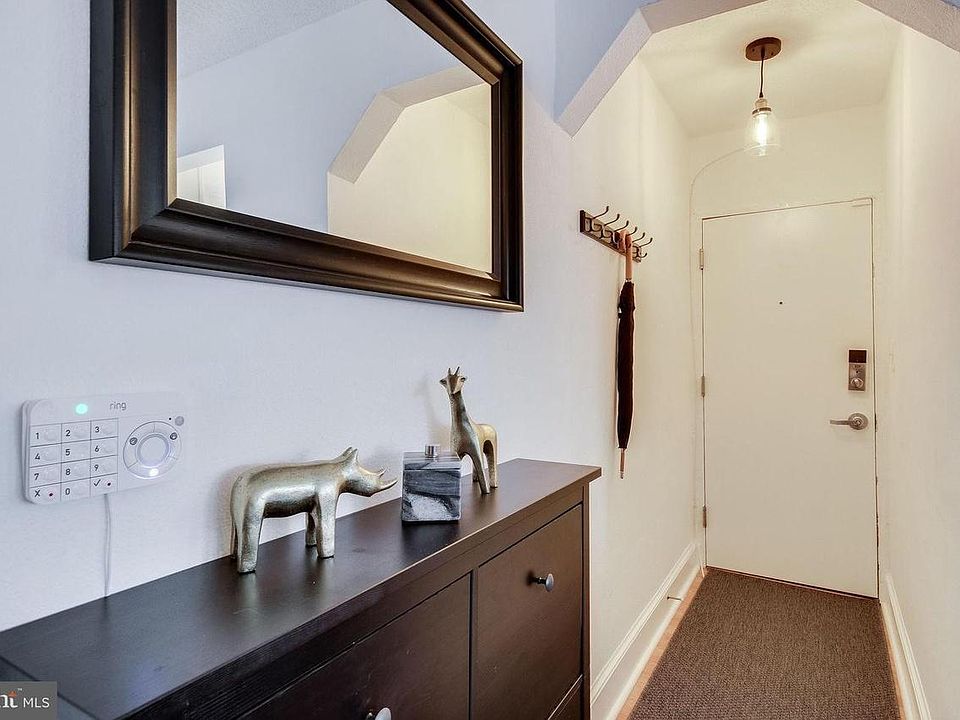 Entryway with coat rack and shoe cabinet