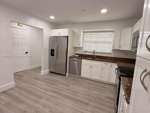 4th image of 7064 Woodmont Ave