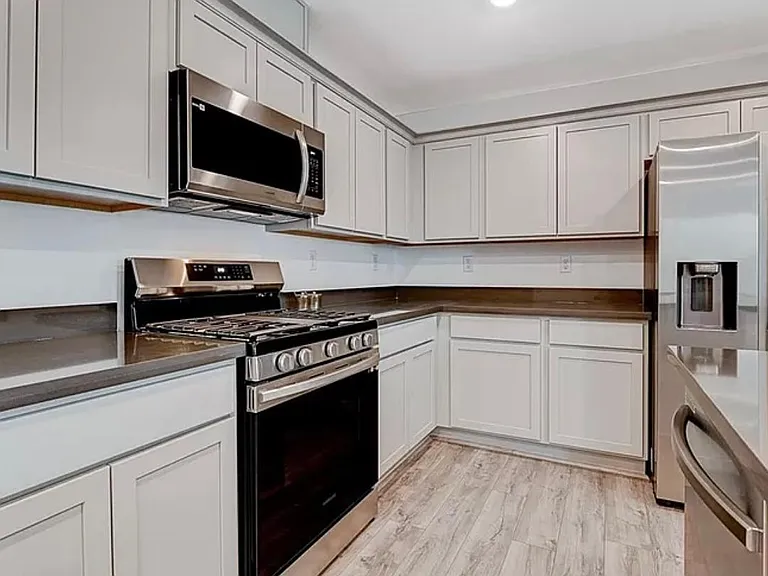 Kitchen with Samsung appliances. Plenty of cabinet space.