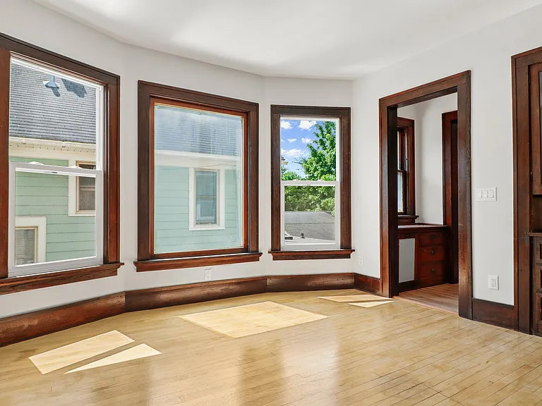 Shot of the dining room looking into an original butler's pantry.