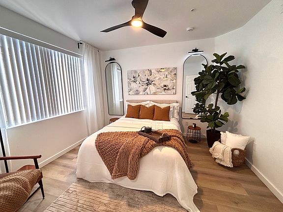 Beautiful, comfortable bedroom with queen bed, remote control lights and fan, spacious closet