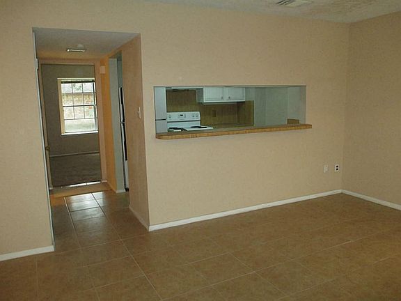 Formal Living Room leads to Kitchen room through hallway.