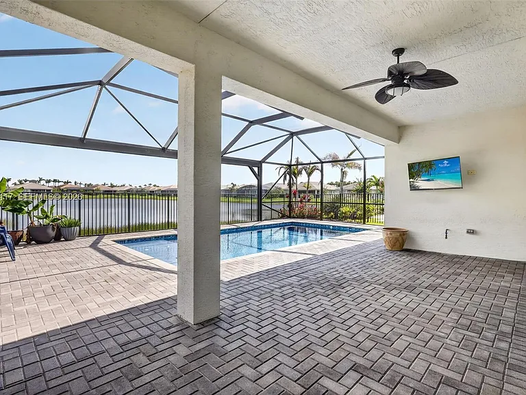 11996 SW Seahorse Springs Ter — Photo 49