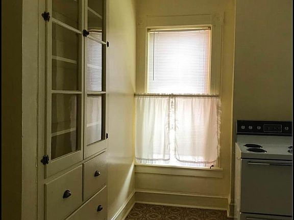 Kitchen with built-in cabinets