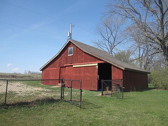 Outbuilding w/ two stalls and workshop, also have chicken house and smoke hous
