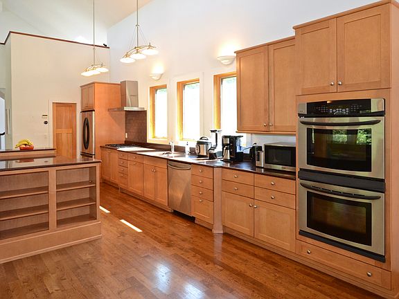 Kitchen with granite countertops and stainless steel appliances