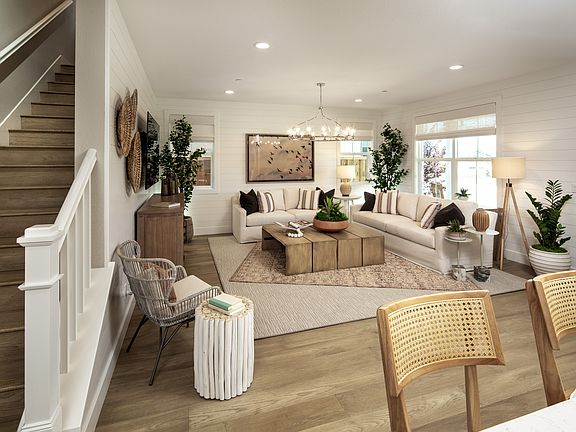 In this open and interconnected space, the kitchen dining room and great room come together to offer