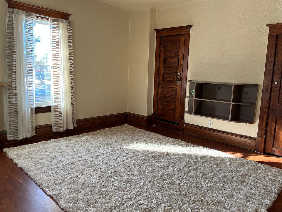 Living room with closet storage area