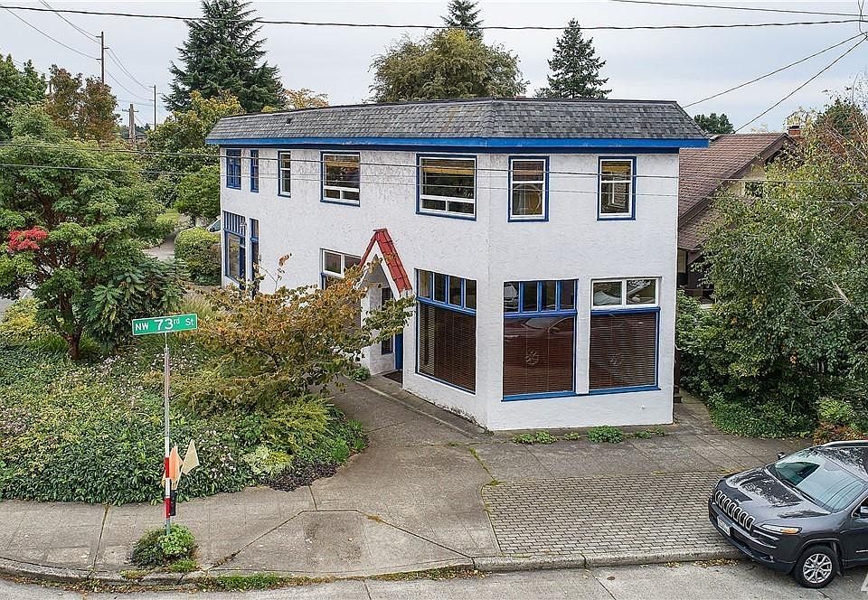 Studio entrance under red tile roof. Tons of light in a very, very walkable neighborhood.