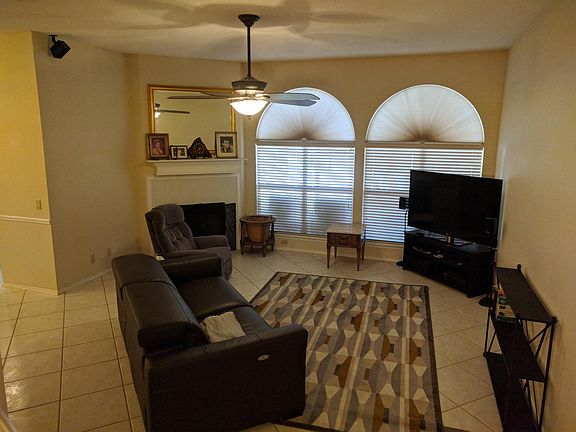Family room wired for surround sound.