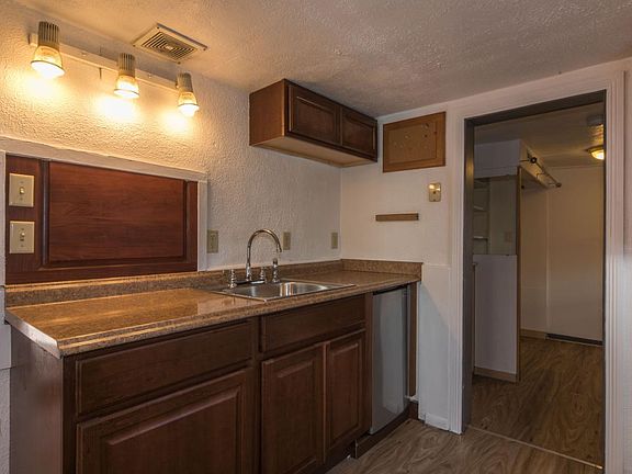 Kitchen with view to bedroom