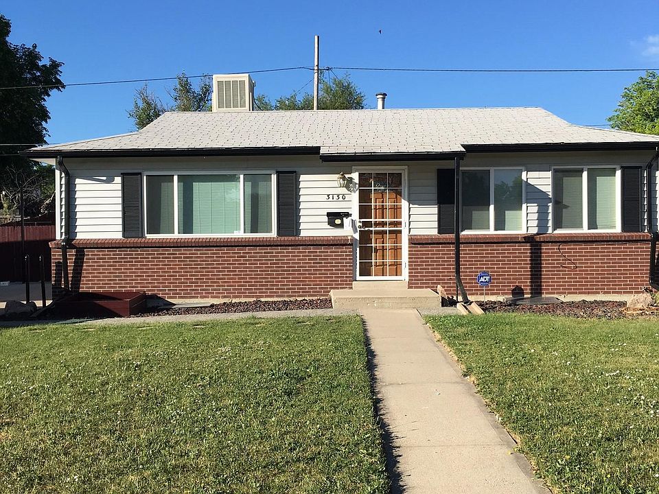 Front of house with beautiful front yard