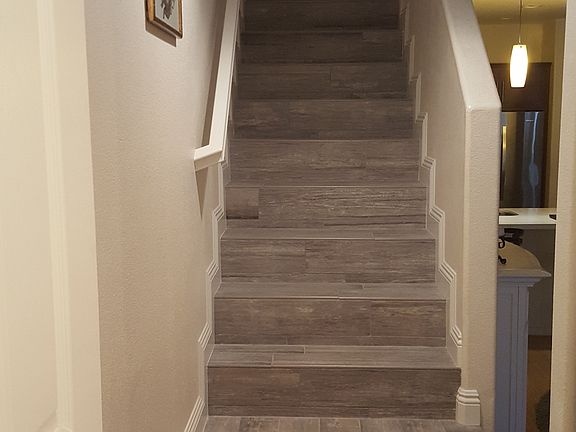 Half-bath looking up stairs