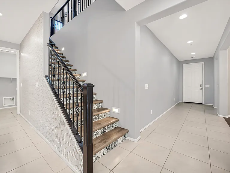 Stairs and rest of the home have all been redone with tile or laminate. No carpets anywhere!