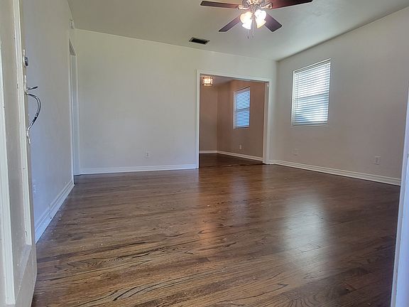 Livingroom from front door looking to kitchen breakfast area