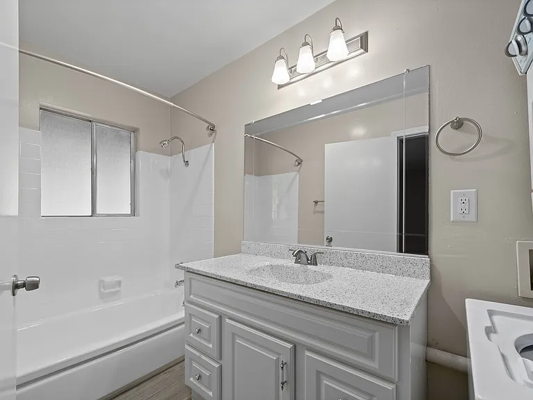 Apartment bathrooms at Mango Tree Apartments in Santa Ana, CA