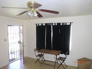 LIVING ROOM LEADS TO YARD