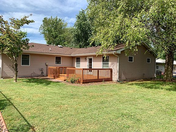 VIEW OF BACK OF HOME AND DECK