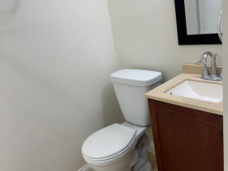 Main floor full bathroom .. large walk in shower with storage closet