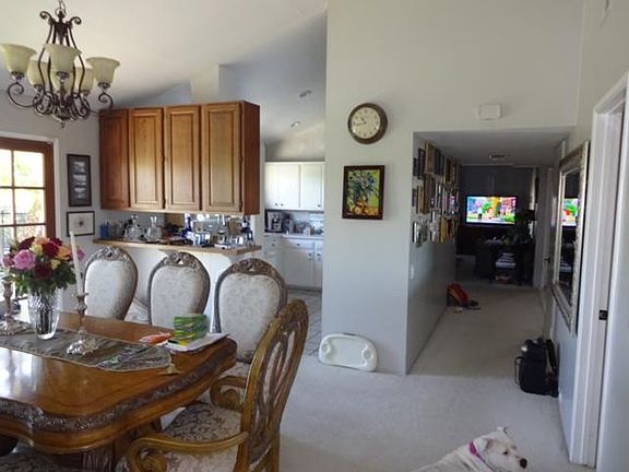 dining room to kitchen and hall to living room
