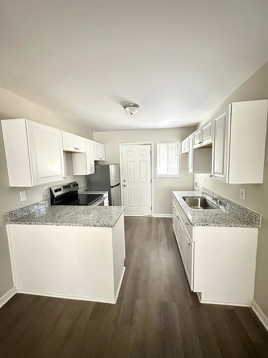 Building Photo - 7740 Rugby Ave #2