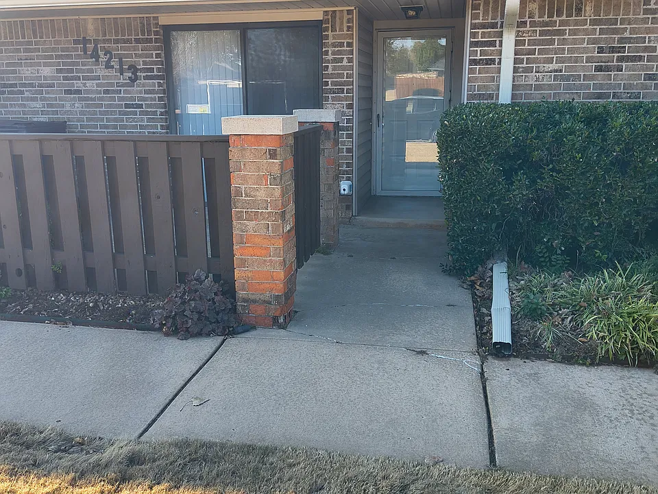 front door entry and to the side is the patio