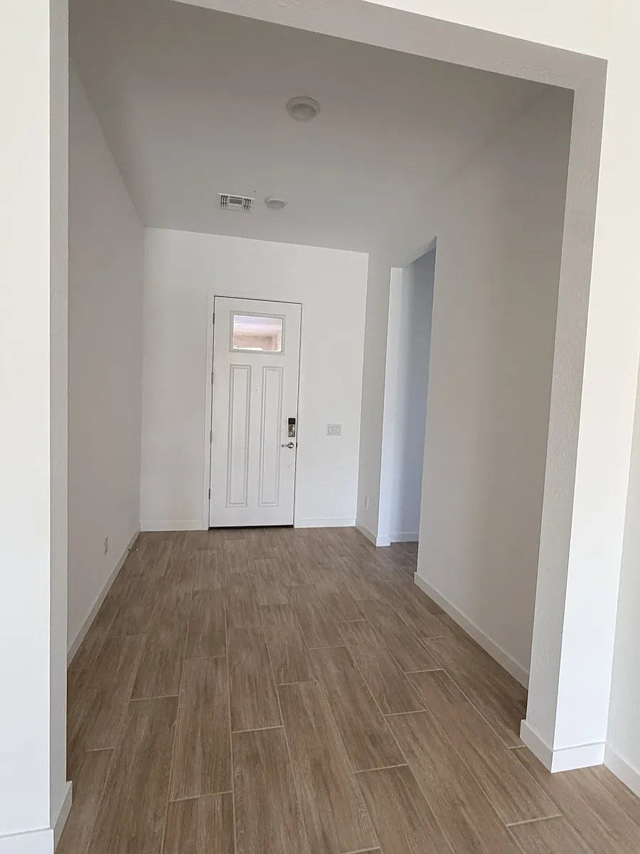 to the front door, 1st and 2nd room on the far right end - 44319 N 43rd Dr