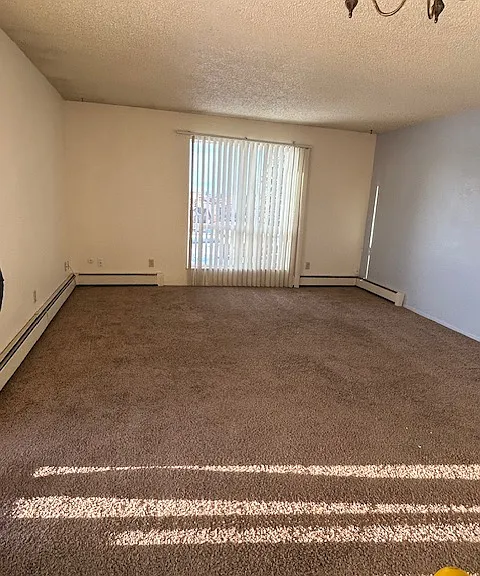 Light and Bright Living Room With Picture Window, Mountain Views..