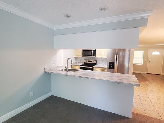 Kitchen from Florida room (facing front door)