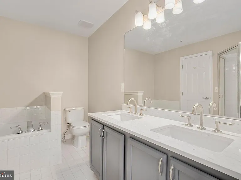 UPPER LEVEL BATHROOM WITH DUAL SINKS