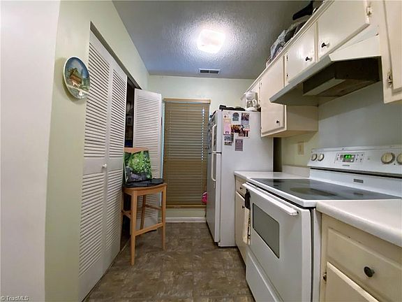 5th image of 303 Village Ln Unit A