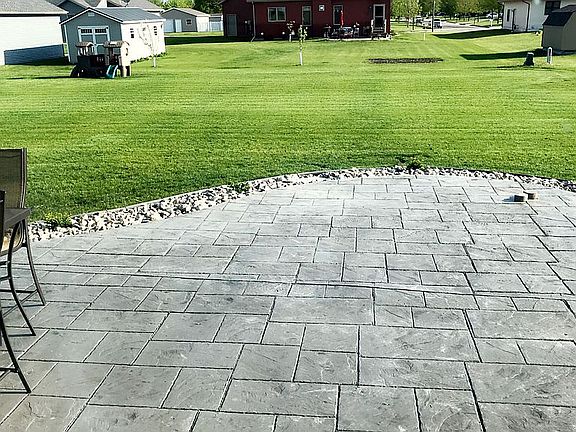 Backyard with concrete patio