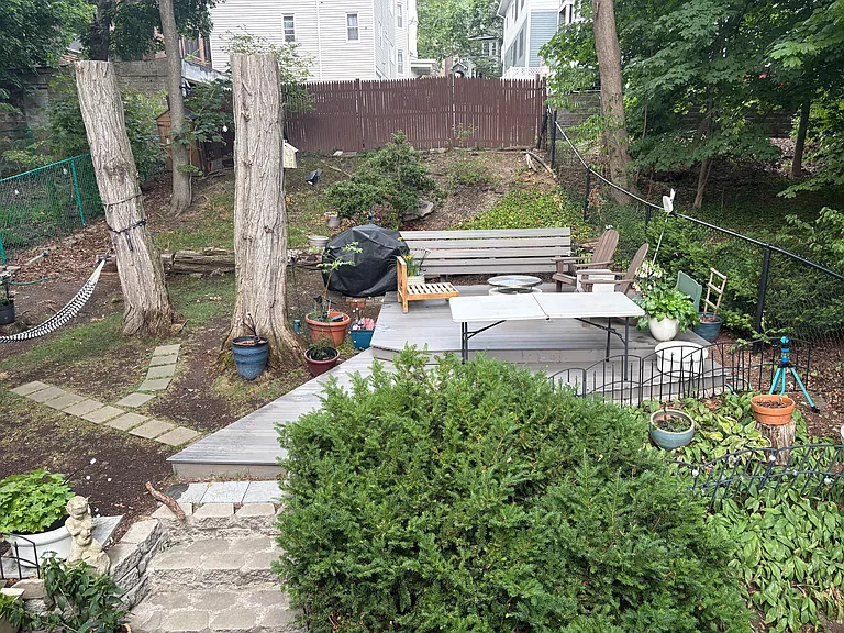 View of owner's back yard from the unit's private deck.