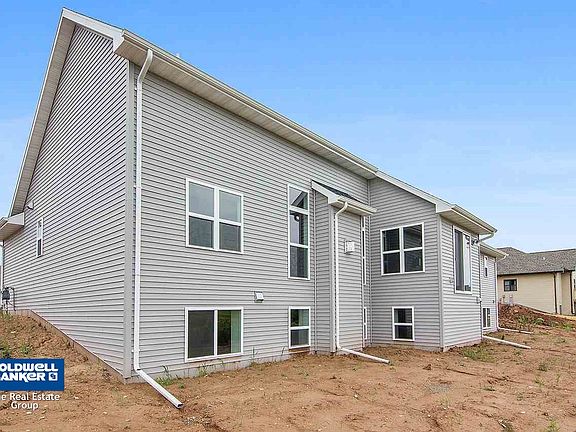 Rear of home wih lowerlevel daylight windows