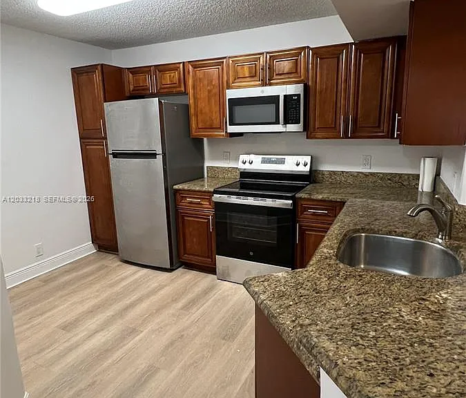 8851 Wiles Rd #108 — Photo 9