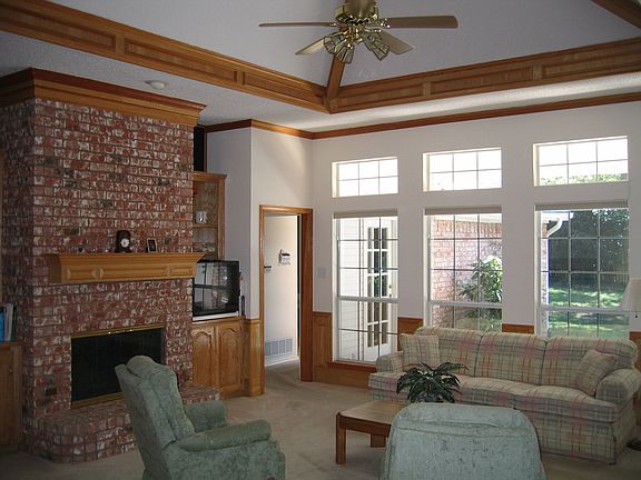 Floor to Ceiling Brick Fireplace Has "Flush Mounted" Tempered Glass Screen
