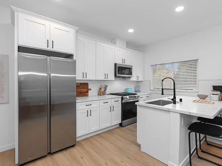 6916 Eberhart St — Photo 11