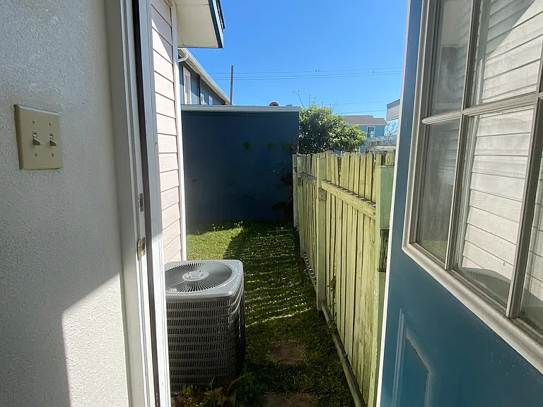 Door to yard from launder room off the kitchen