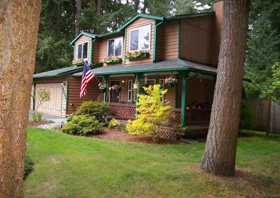 Charming home on exceptional third acre lot.