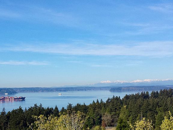 This is the apartment's backyard. Unobstructed views of Puget Sound and the entire Olympic Mountain range.