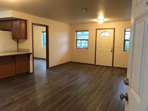Open 
Living area with breakfast bar to kitchen