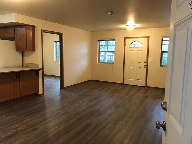 Open
Living area with breakfast bar to kitchen