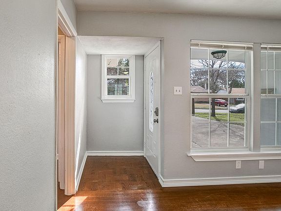 New windows let in lots of natural light in the living room.