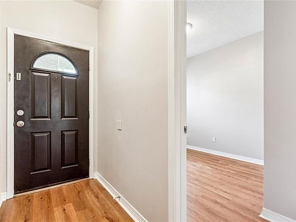 Foyer with light wood-type flooring
