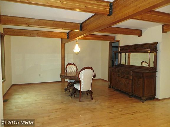 Dining Room w/Exposed Wood Beams