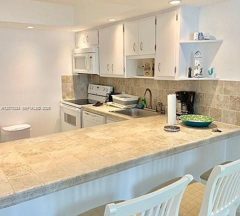 4th image of 5701 Collins Ave APT 311