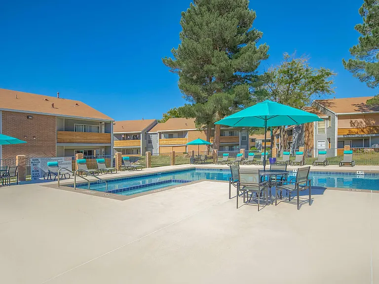 Relax by the Pool at Wind Tree Apartments in El Paso, TX